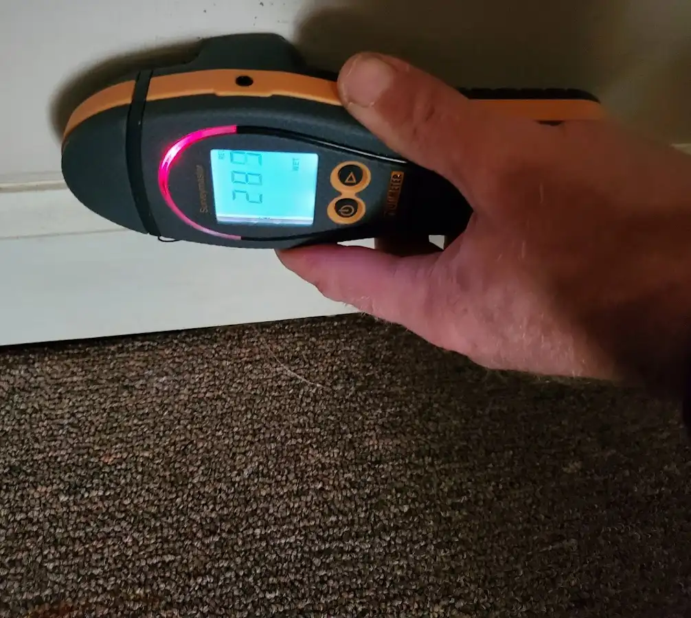 Moisture detection at baseboard during Burst Pipe Cleanup in Monfort Heights